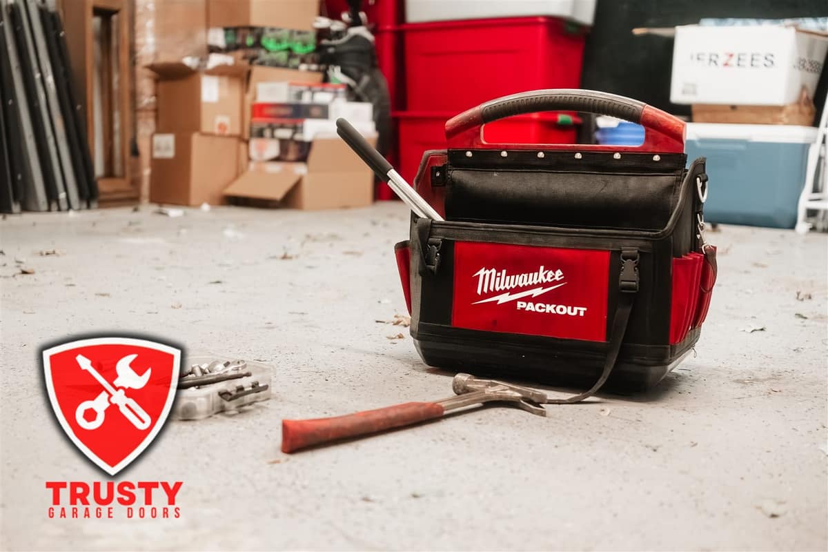Professional commercial rolling steel door repair tools used across DFW